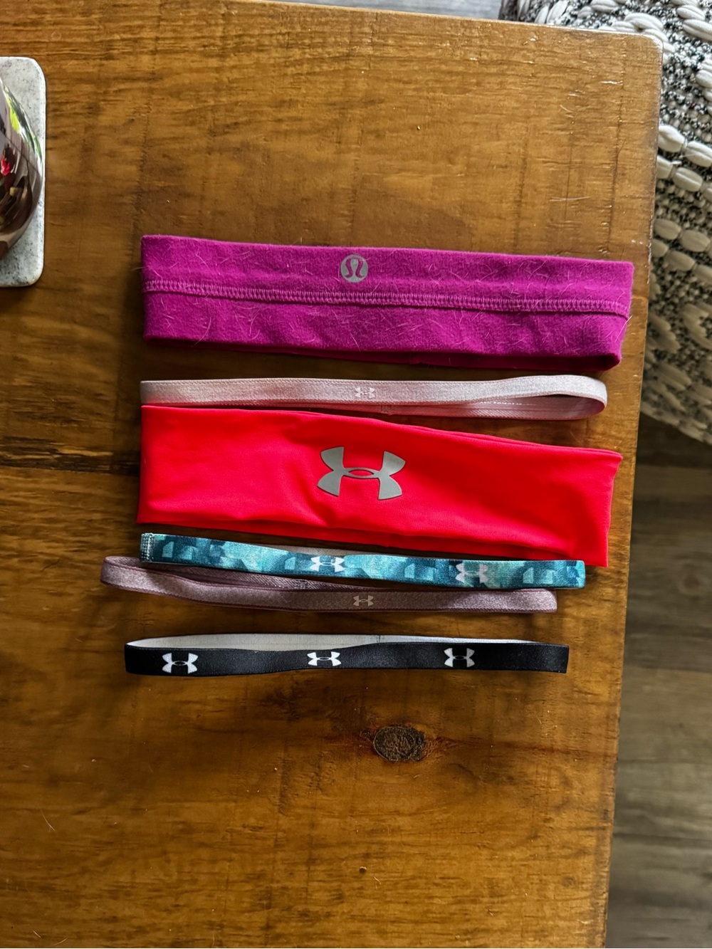Assortment of Under Armour and Lululemon headbands